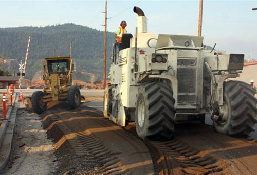 Contractors Building a Road Together